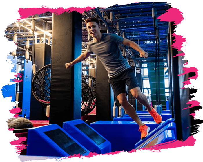 Guy running though BOUNCE X-RUN doing the race